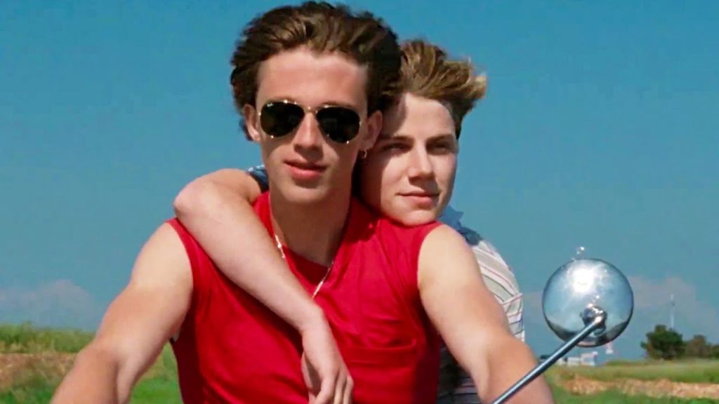 A photo still of the two male leads riding a motorcycle in Été 85.