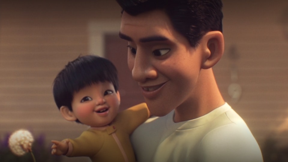 A photo still of the father holding his baby son in the short film Float.