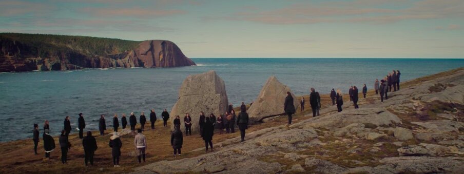 A photo still from the video of Warrior by the Lady Cove Women's Choir & Eastern Owl.