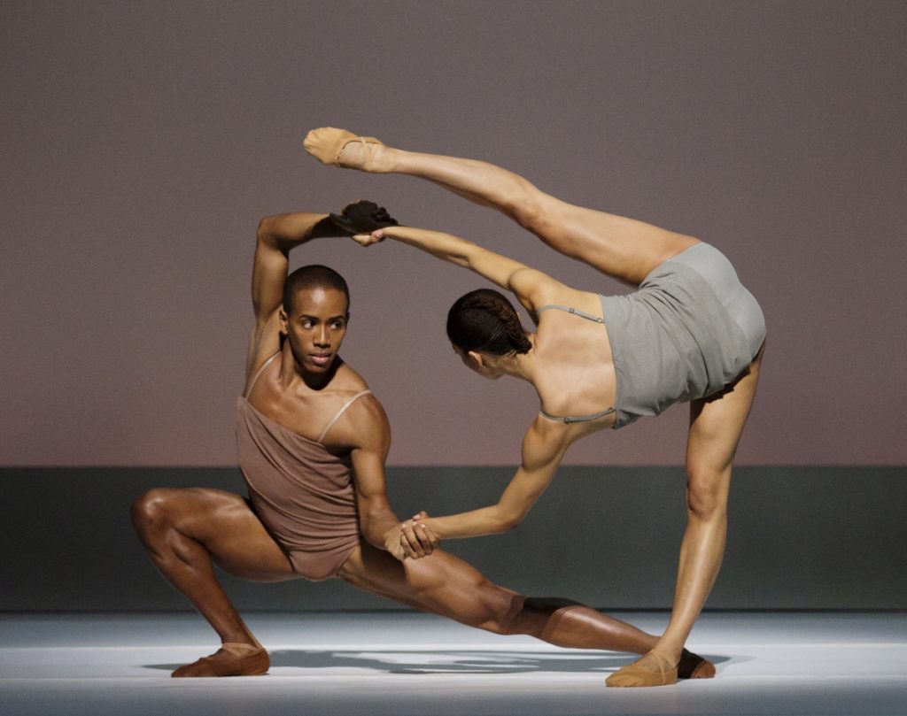 A photo still from the performance of The Hardest Button to Button by Laura Morera and Eric Underwood.
