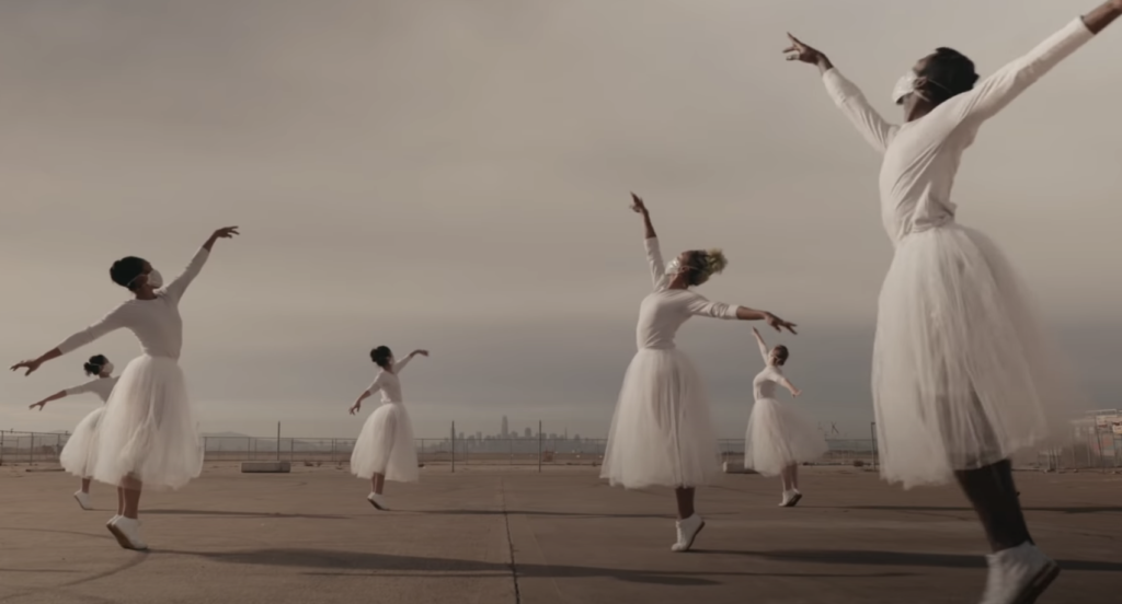 A photo still of the dancers from Post:ballet, mid-performance of Waltz of the Snowflakes