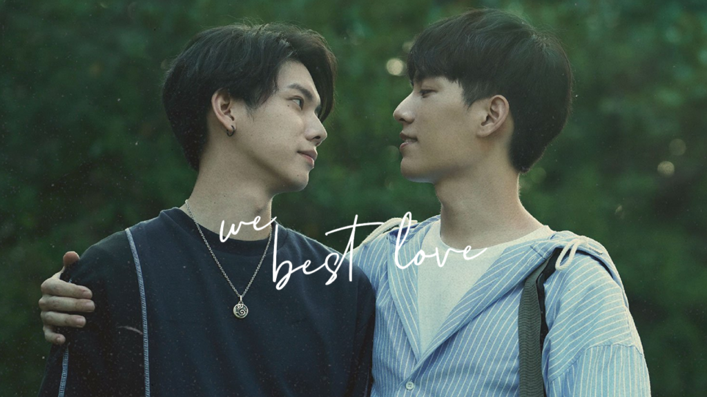 A promotional photo from the television series We Best Love: No. 1 For You. The two lead actors are standing outside, side by side, one with his arm around the other, and they are staring at each other and smiling.