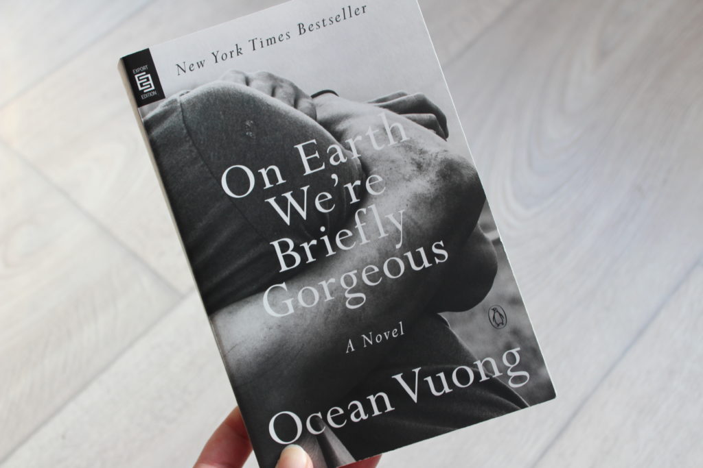 A close up photo of the cover of On Earth We're Briefly Gorgeous by Ocean Vuong.