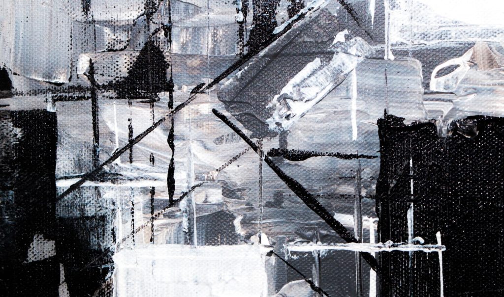 A black and white abstract painting.