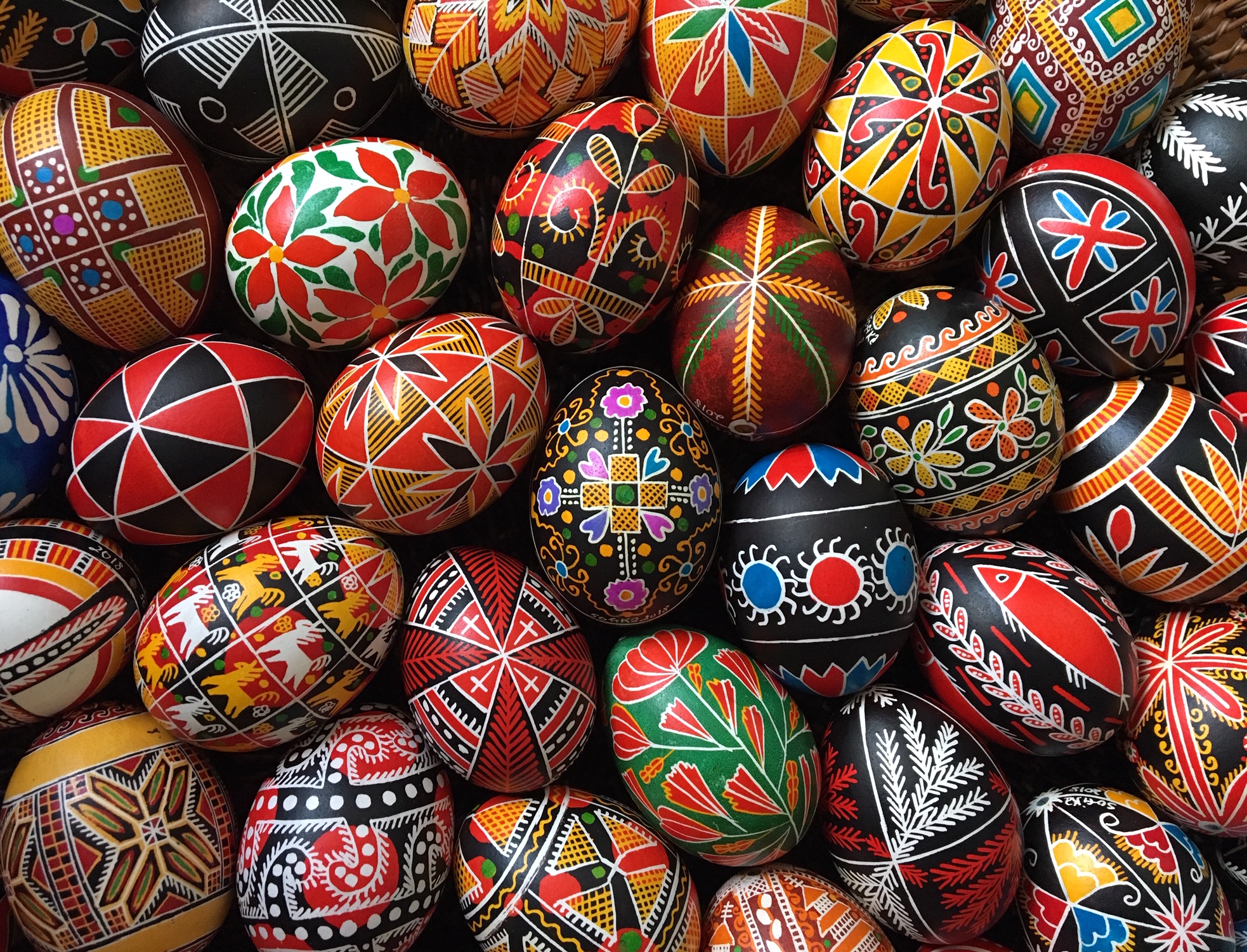 An image of dozens of pysanka eggs