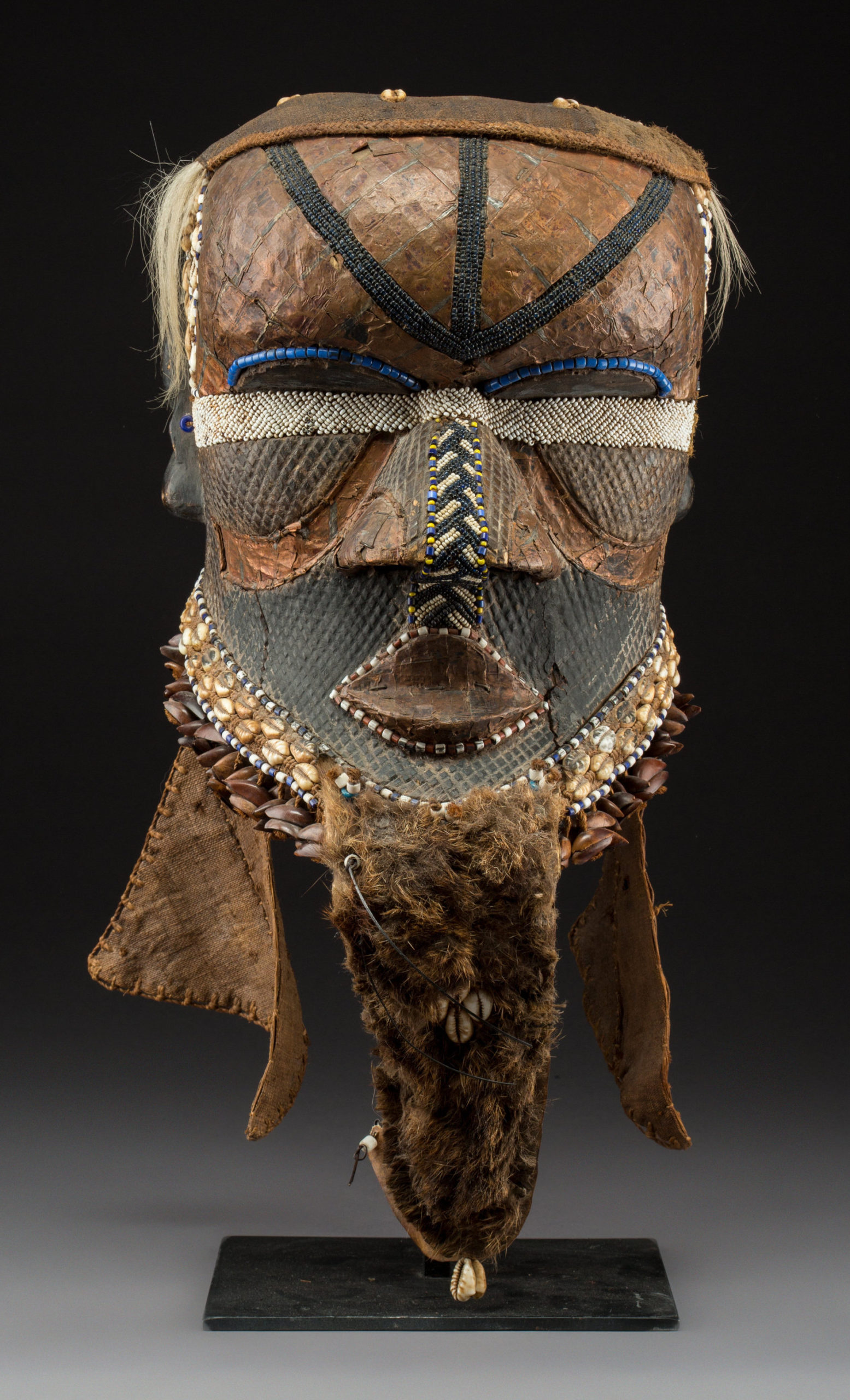 A photo of a Bwoom mask, one of the three royal masks of Kuba masquerade