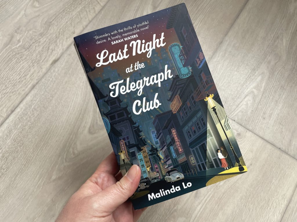 A close up photo of the cover of Last Night at the Telegraph Club by Malinda Lo.