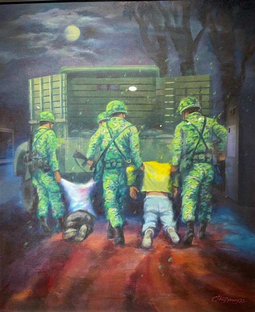 A photo of a painting by Choi Jae-Young. It depicts three soldiers dragging two citizens between them towards the back of a military vehicle.